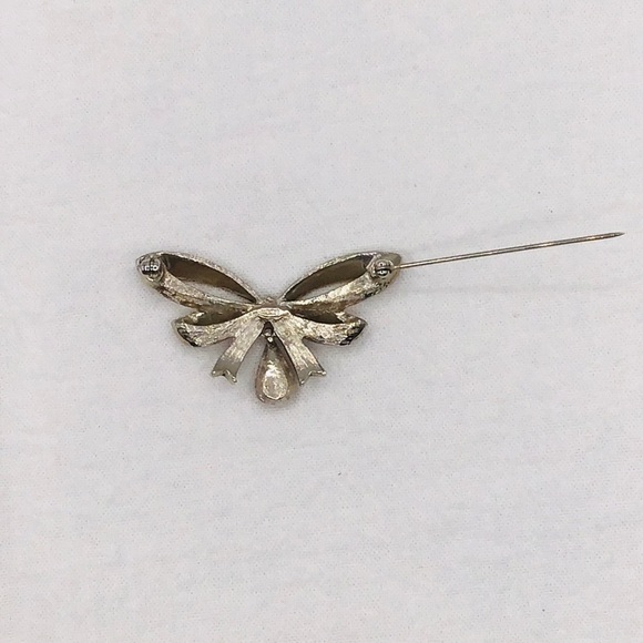 VINTAGE Avon Brooch Birthday Bow Faux Ruby Birthstone Silver Tone Rhin… - Picture 5 of 7